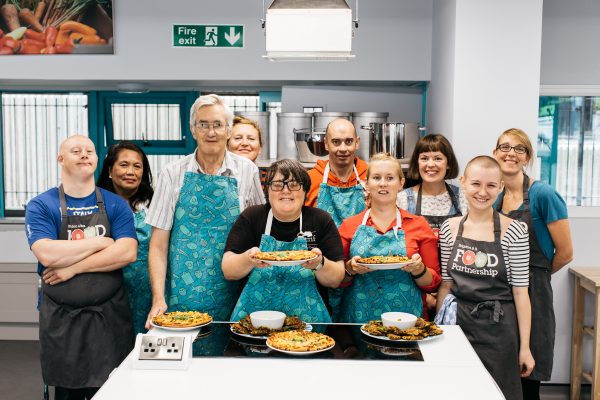 cooking class - people with their dishes