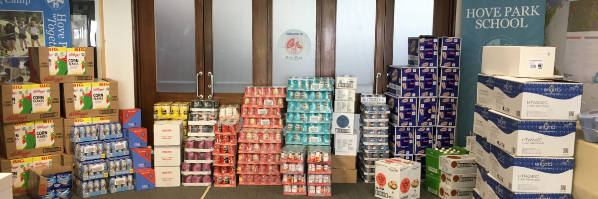 Piles of food stacked up in the foyer of Hove Park School for the food hub packages.